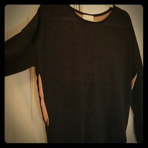 Medium black sheer shirt with chiffon inserts.